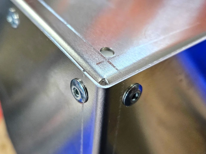 A fabricated aluminum enclosure