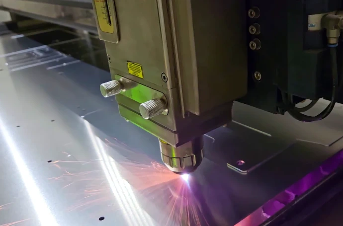 Laser cutting of sheet