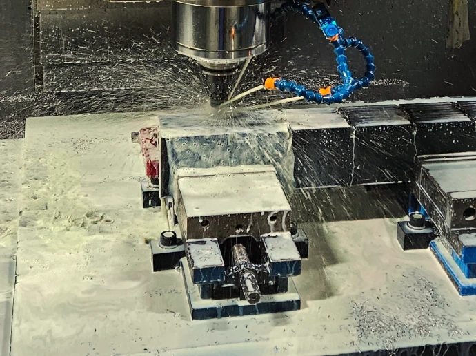 A part being cut via CNC machining